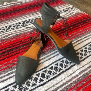 Black flats with tie around ankles